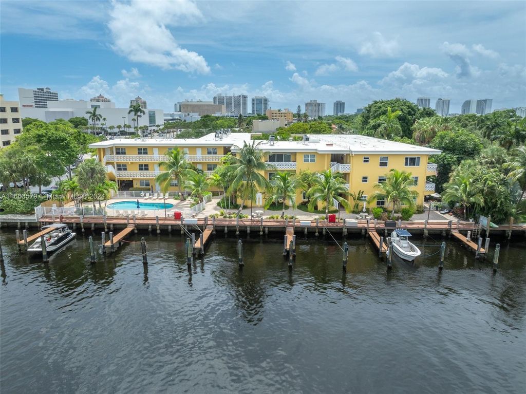 Photo of 815 Middle River Dr #317, Fort Lauderdale, FL 33304 (MLS # A11663579)