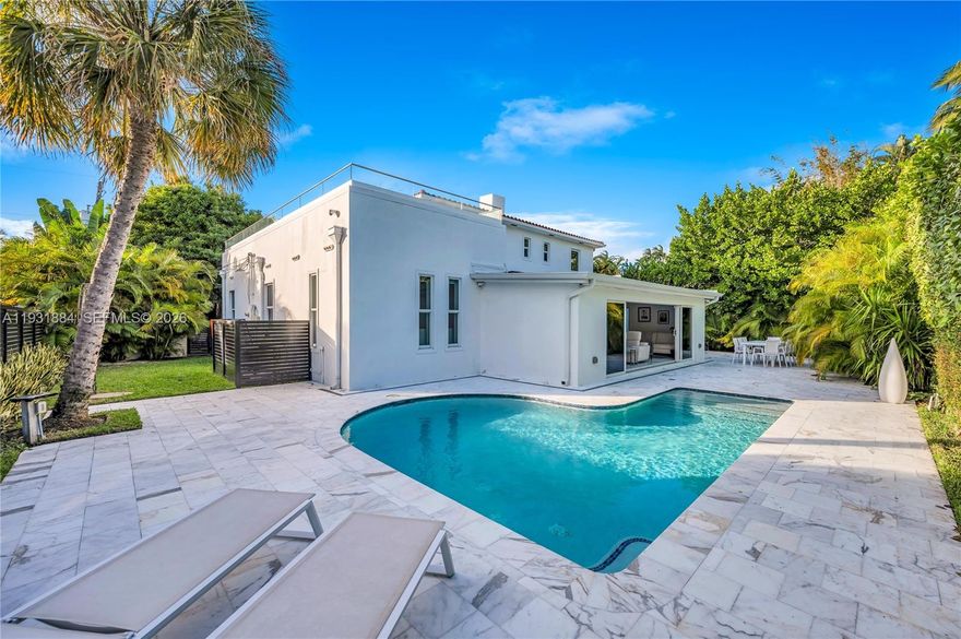 Just bring your furniture and personal items—this home is fully completed and ready to be enjoyed. Situated in a peaceful, family-friendly Miami neighborhood known for its strong sense of community, the residence offers close proximity to parks, schools, and everyday conveniences, while still providing easy access to the water, beaches, and the city’s best dining and entertainment.
The home has been fully rebuilt to near new-construction standards, retaining only the original concrete walls. It has been completely reimagined with a redesigned floor plan and reconstructed using high-end materials and modern systems throughout—a property that truly must be seen to be fully appreciated.
Finishes include Carrara marble flooring indoors and outdoors, custom Italian concealed doors, premium countertops, a designer staircase, and top-of-the-line appliances. Major upgrades include a brand-new roof, resurfaced pool, and a new terrace deck, creating seamless indoor-outdoor living.
Additional features include electric screens and blinds, full crawl-space encapsulation, and a flood-prevention pump system. All fixtures are included in the purchase, except for seven pendant lights located in the dining room, staircase, living room, primary bedroom, entry, and downstairs bedroom.