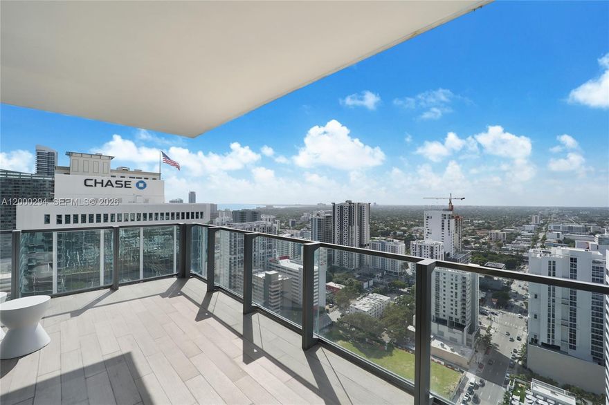 Turnkey, amenity-rich, walk-everywhere. Freshly priced for action, STUNNING VIEWS throughout, WRAPPING BALCONY, 3 BED / 3 BATH / 1 HALF BATH — 2,203 SF TOTAL at Rise Brickell City Centre delivers floor-to-ceiling skyline views, a quartz + premium-appliance kitchen, marble floors, custom built-out closets, motorized shades, Nest climate, and in-unit W/D. LEED-certified, full-service building with tropical gardens, BBQs, valet & 24/7 concierge, fitness center, full spa/hammam, serviced pools, children’s room, library, and business center. Elevator to BCC luxury shopping, dining, and transit. Professionally staged; turnkey furnishings package available.