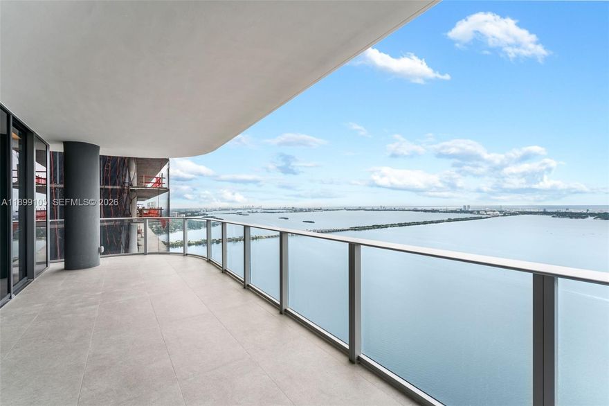 Spectacular high-floor residence at Aria Reserve South Tower, Line 01 (54th floor), featuring 4 bedrooms + office with direct Biscayne Bay and Ocean views. Fully upgraded with all developer options, including Arabescato porcelain floors, Cromat Gray terrace tile, custom ceilings with LED lighting, Somfy motorized shades, upgraded kitchen with Serena Matte countertops, custom illuminated closets, frameless shower glass, and matching bath accessories. Smart-home ready (Savant compatible). Enjoy world-class amenities: sunrise & sunset pools, spa, gym, tennis courts, dog park, kids area, lounge, and direct baywalk access in the heart of Edgewater. Walking distance to restaurants, shops, and minutes from Design District, Wynwood & Downtown Miami. A true masterpiece in the sky.