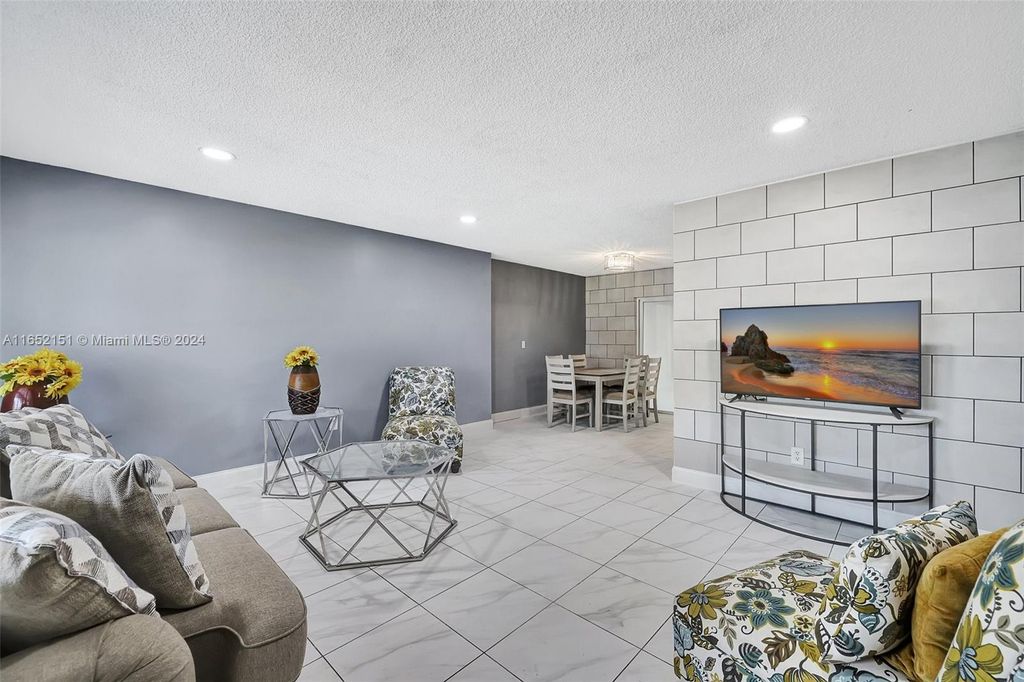 Photo of 711 SE Floresta Dr, Port Saint Lucie, FL 34983 (MLS # A11652151)