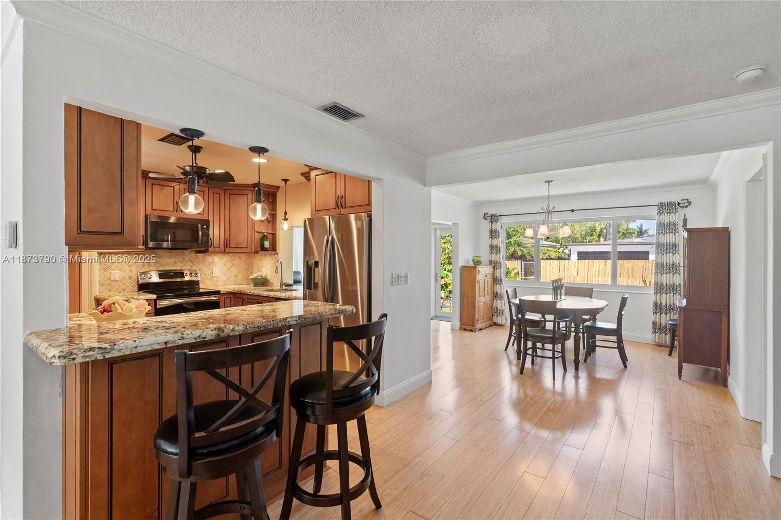 Welcome to this beautifully updated 3-bedroom, 2-bath home with a spacious family room and approximately 1,500 sq. ft. of living space. Nestled in the highly desirable Hollywood Lakes neighborhood, you’ll enjoy being just minutes from the beach, shopping, and dining. Key Upgrades Include: New Roof / New Impact Windows, Doors and Garage Door / Cast Iron Pipes replaced with New PVC pipes / New AC / One Car Garage!
This home combines classic charm with modern improvements, making it a solid investment in a sought-after location. Schedule your private showing today and experience the best of Hollywood living.