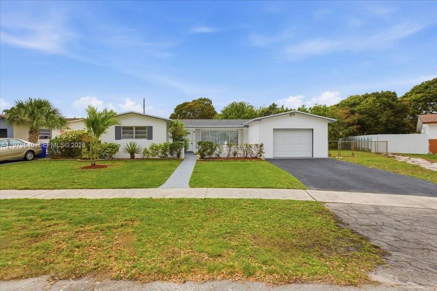 Welcome to your dream home in the heart of Pembroke Pines! This beautifully remodeled 4-bedroom, 3-Full bath  1 car Garage residence is a perfect blend of modern elegance and comfort. As you step inside, you'll be greeted by a bright and airy open kitchen, featuring stunning quartz countertops and pristine white cabinets that create a fresh, inviting atmosphere. Brand new stainless steel appliances make cooking and entertaining a delight, and the layout provides ample space for gatherings and family meals. Each of the three bathrooms has been meticulously remodeled, showcasing stylish finishes that elevate the overall aesthetic of the home. New flooring throughout adds a modern touch, ensuring that every room feels warm and welcoming. An oversized backyard with 9,415 SqFt, offering plenty of room for a pool, outdoor entertaining, or creating your own serene oasis. Located in a desirable neighborhood, this home is ready for new owners to bring their vision to life. NO HOA Restrictions to deal with. Park your boat, RV or truck Don't miss the opportunity to own this exceptional property that perfectly balances luxury and functionality! Brand new 2026 Roof, 2025-A/C, 202-Water heater, 2026-Appliances.
