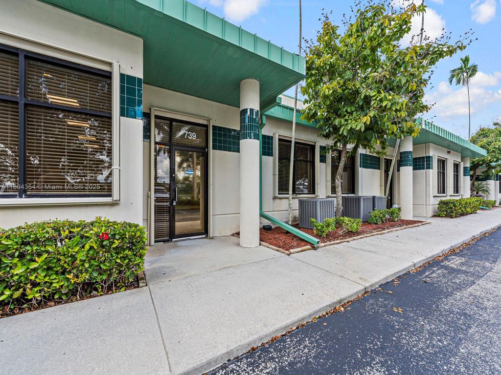 Photo of 739 Shotgun Rd, Sunrise, FL 33326 (MLS # A11894354)