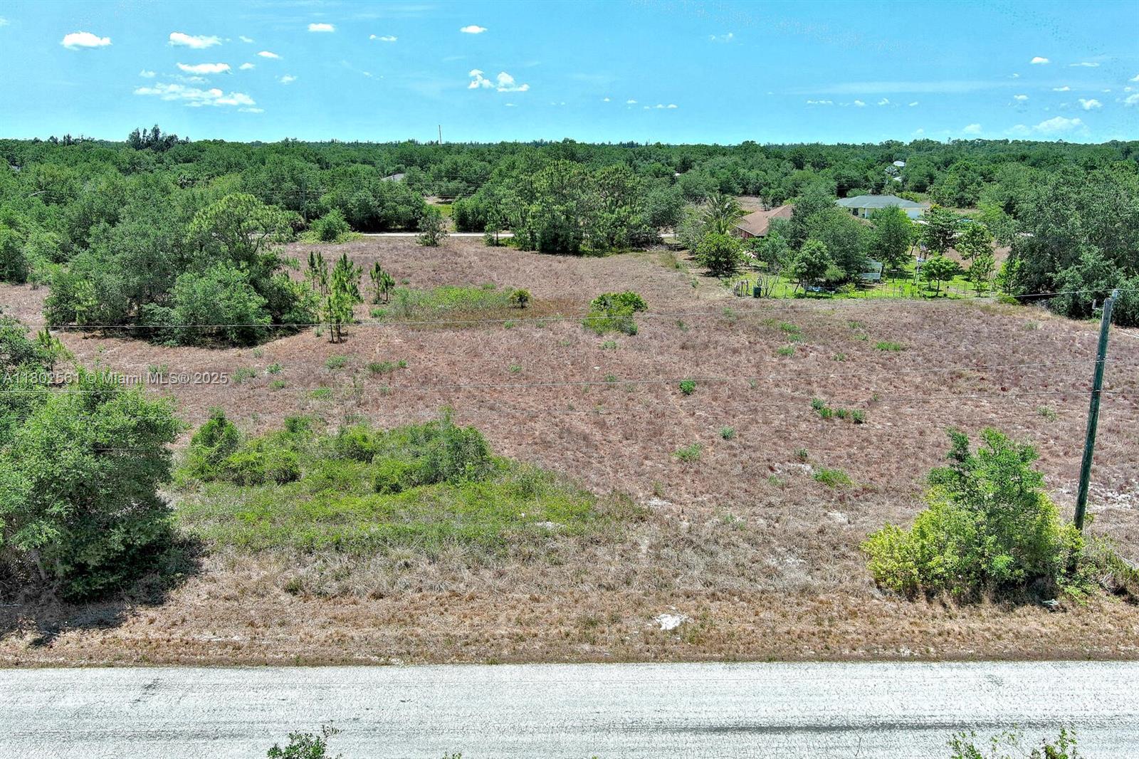 Exclusively presented by Sunland Real Estate: Great buildable half-acre parcel that is already cleared. In East Lehigh Acres just off Joel Blvd, with quick access to State Road 80 and Interstate 75, plus all that south west Florida has to offer. This lot is high and dry and is a very desirable area in Lehigh Acres.