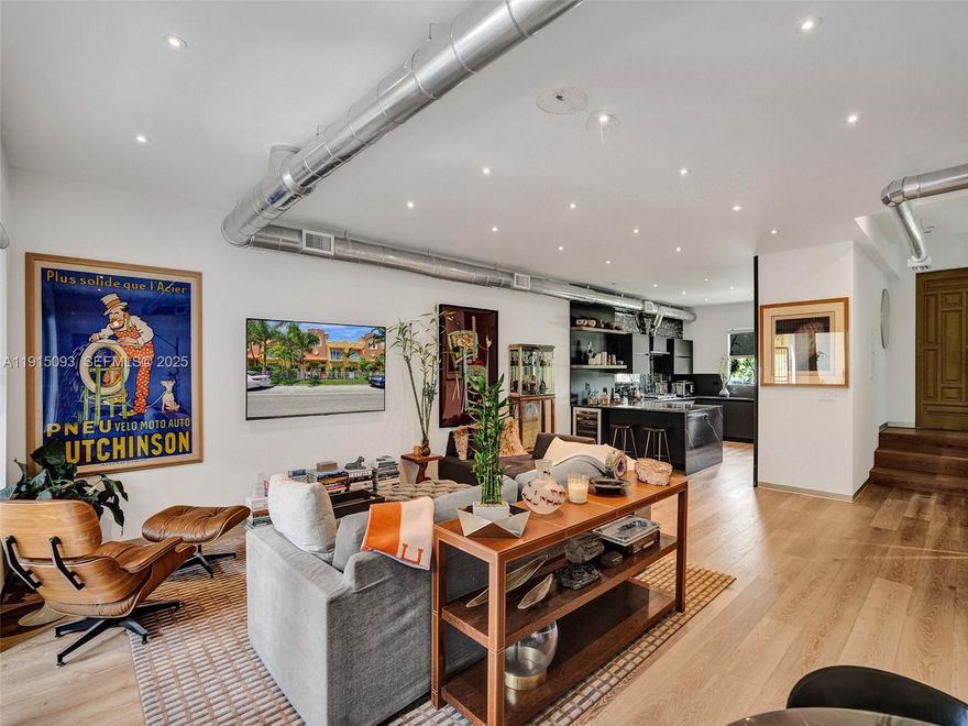 Beautifully and completely renovated in 2024, this stunning 3BD/2.5BA home in East Hollywood offers over 2300 SF of bright and spacious living. Loft area,2 car garage, and exclusive rooftop rights- perfect for a jacuzzi, bar, BBQ, or outdoor gym with a cold plunge- make this home truly exceptional. Soaring 10FT ceilings enhance the open feel, while the chef's kitchen features Silestone counters, a five-burner gas stove, double ovens, stainless steel appliances, and a large peninsula with wine cooler and added cabinetry. Wide-plank European white oak floors, elegant glass railings, and eight-foot frameless glass doors add a modern, upscale touch. A large covered patio with natural gas BBQ setup, and a serene fish pond creates an ideal outdoor retreat. Impact windows provide peace of mind, and the primary suite offers a private balcony, walk-in closet, and luxurious ensuite bath. Fully fenced with beautiful landscape and lighting, the property is minutes from Hollywood Broadwalk, beaches,dining,shopping and places of worship. With very low monthly maintenance, this turnkey home is priced to sell- you won't want to miss it.