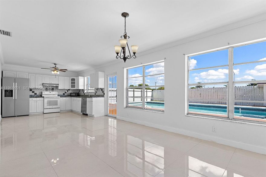 Potential $15,000 credit to buyer. This Miramar home is full of potential and ready for the buyer who loves a good project. The main house offers 3 bedrooms and 1.5 baths, with the half bath easily convertible into a full second bathroom. Enjoy a renovated kitchen with newer appliances and large windows that bring in great natural light. A fully equipped in-law suite with its own bedroom, bath, and kitchenette provides rental income potential or the option to create a 4BR/2.5BA layout. The standout 25x18 pool is perfect for entertaining or relaxing. Ideal for investors or first-time buyers looking to upgrade little by little. Schedule your tour today. Easy to Show.