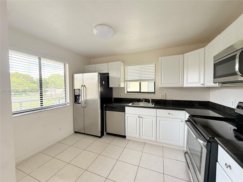 Photo of 432 Lakeview Dr #201, Weston, FL 33326 (MLS # A11969376)