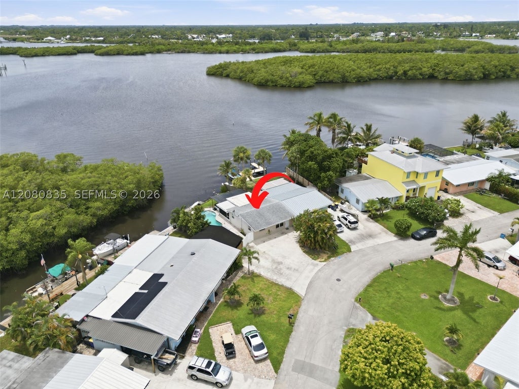 Photo of 70 SW Hideaway Pl, Stuart, FL 34994 (MLS # A12080835)