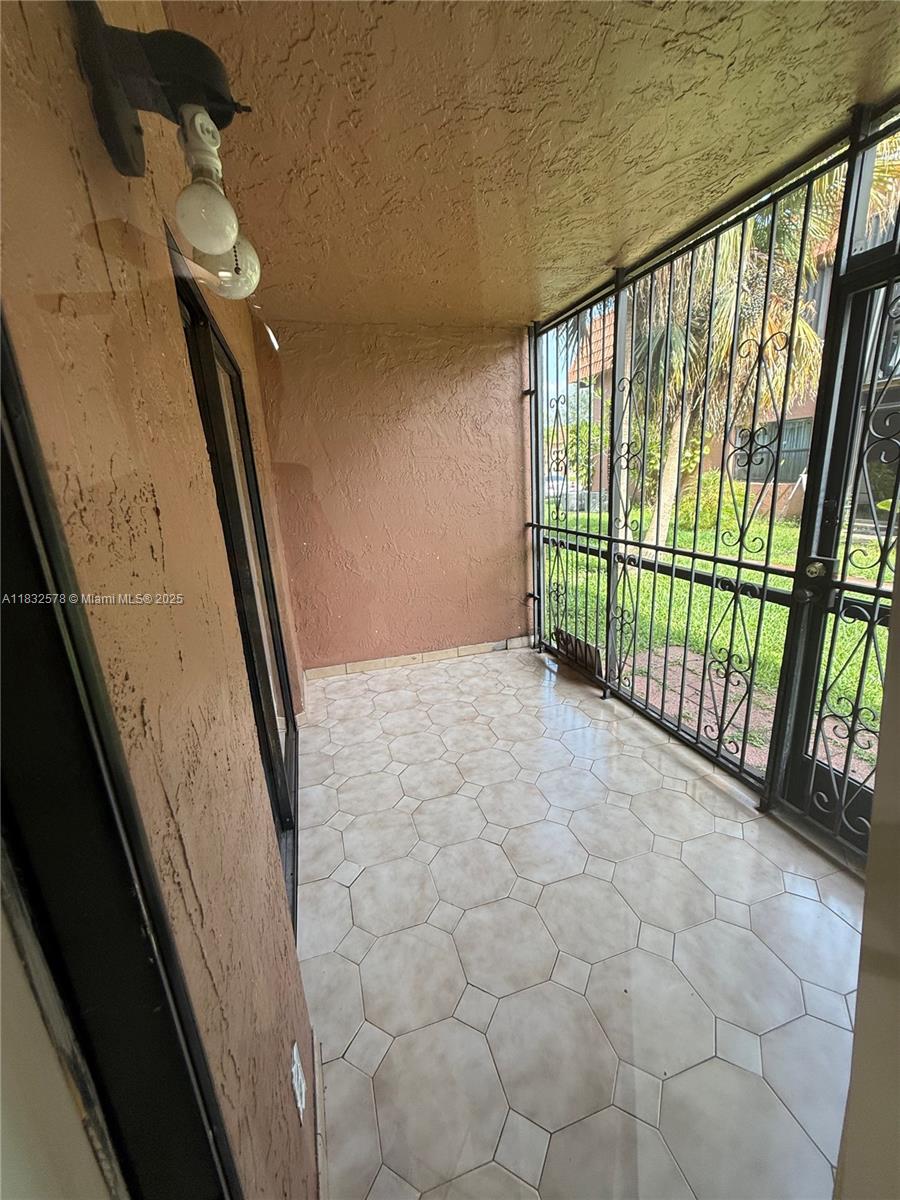 Bright 2 Bed, 2 Bath in a Gated Hialeah Community. This well-kept 2-bedroom, 2-bath apartment offers comfortable living in a convenient location. Featuring tile floors throughout, an open layout with unique floor detail, in-unit washer and dryer, and updated bathrooms. Enjoy a bit of outdoor space with a private terrace—perfect for relaxing. Located in a gated community close to schools, shopping, and major roads. A great spot to call home!