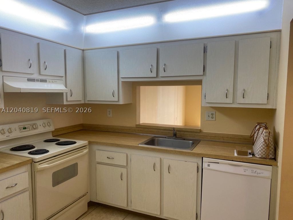 Photo of 1810 SW 81st Ave #2311, North Lauderdale, FL 33068 (MLS # A12040819)