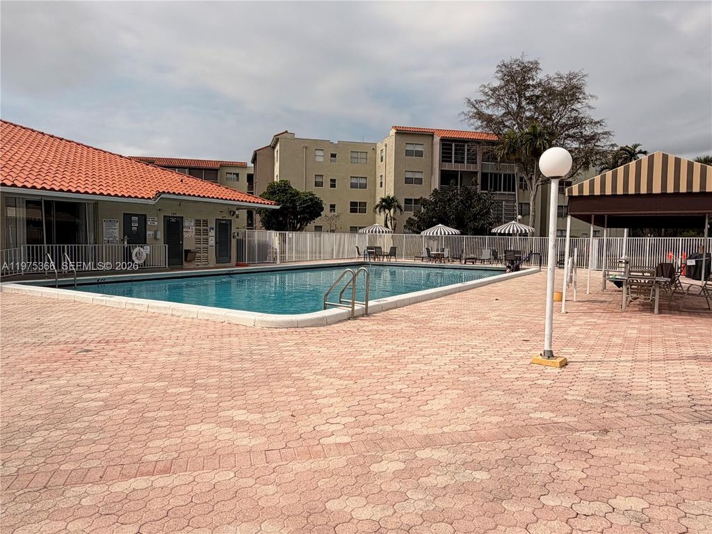 Photo of 1800 SW 81st Ave #1100, North Lauderdale, FL 33068 (MLS # A11975366)