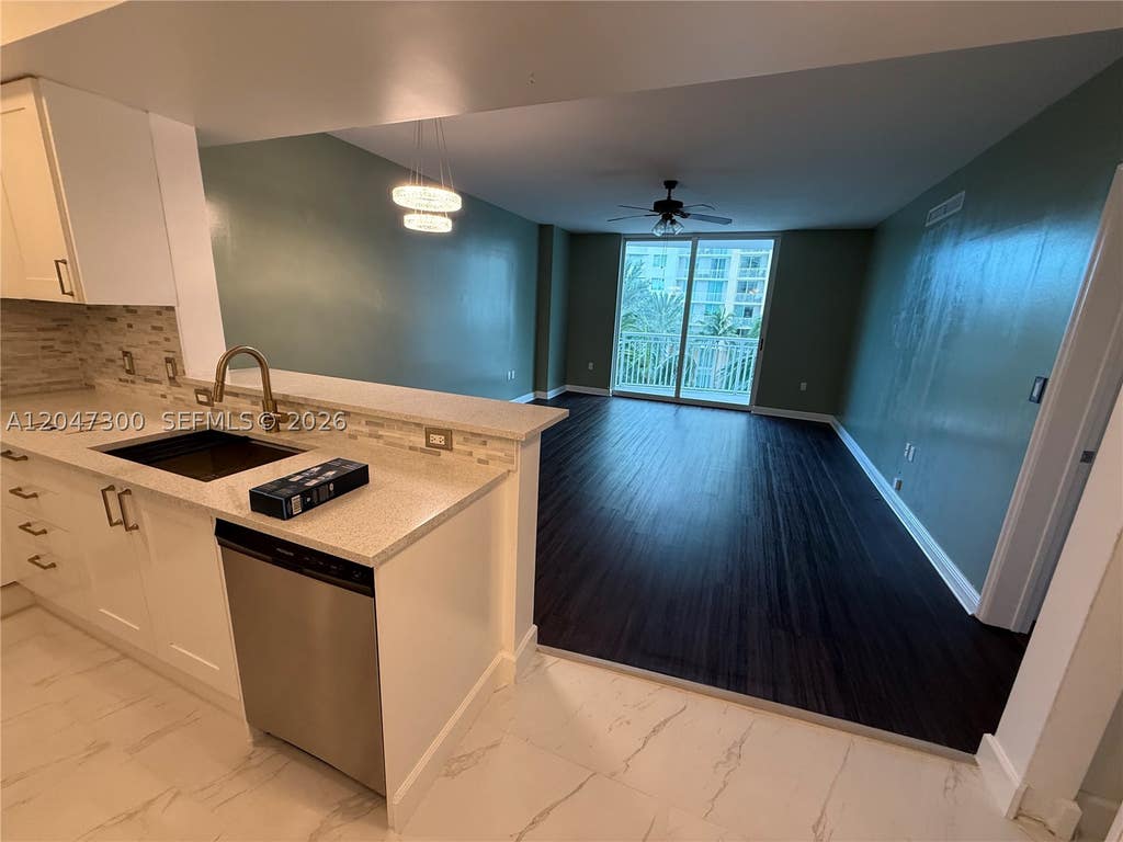 Photo of 1745 E Hallandale Beach Blvd #304W, Hallandale Beach, FL 33009 (MLS # A12047300)