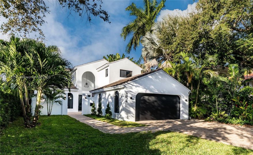Exquisitely and newly renovated turnkey home in the best South Coconut Grove location on a coveted street. With the highest-end custom finishes and a wonderful open layout, this home is ready to entertain! Features include: custom Italian kitchen with Thermador appliances including a gas range and dual ovens, new impact doors/windows providing light-filled spaces, grand pivot door entrance, wine cellar, European oak flooring, high-end light fixtures with Lutron full home automation, new bathrooms with custom vanities, exotic stone countertops, new MEP systems, all finished to exacting standards. Luxurious spa-like master bath with steam shower, freestanding tub overlooking your balcony, lush backyard and heated salt water pool. Over 4,000 total square feet per survey. Not in a flood zone.