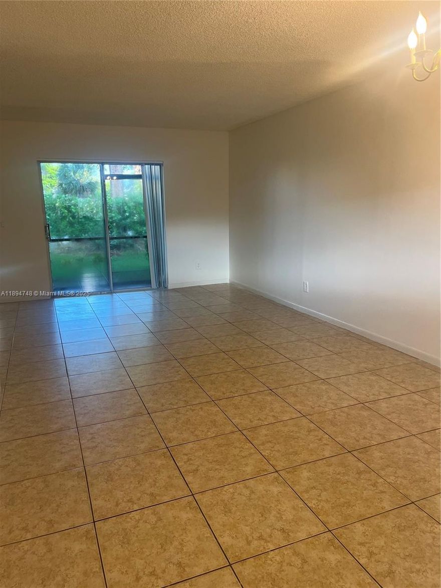 Condo apartment (2/2) at the lovely Bella Grand community in Pembroke Pines. Ready for move-in with ceramic floors. Washer and dryer in unit for tenant's convenience. Fast approval and caring landlord.Bella Grand is a well funded, well maintained and safe community. Amenities include a club house, pool and tennis courts. Located right off Johnson and Hiatus. Five minutes away from Pembroke Lakes mall, close to good schools.
