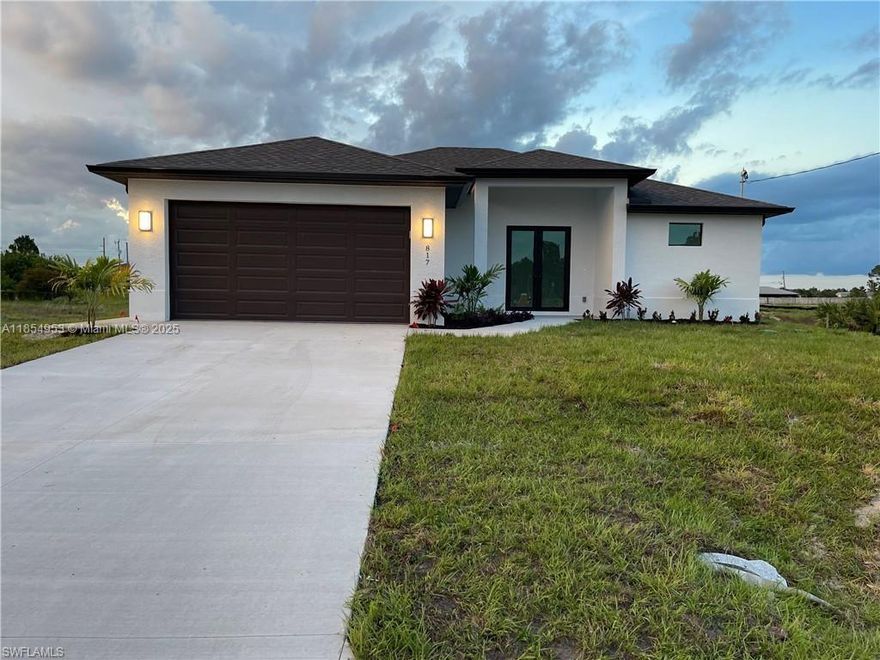 Welcome to your dream home in Lehigh Acres! This stunning single-family home boasts 3 bedrooms, 2 bathrooms, and a spacious 2-car garage. The modern finishes include granite counters, stainless steel appliances, and high impact windows. With high ceilings and a canal waterfront view, this home offers a luxurious and peaceful retreat. The best part? No HOA fees or CDD taxes to worry about. Don't miss out on the opportunity to own this beautiful property in a desirable location. Make this house your home today!