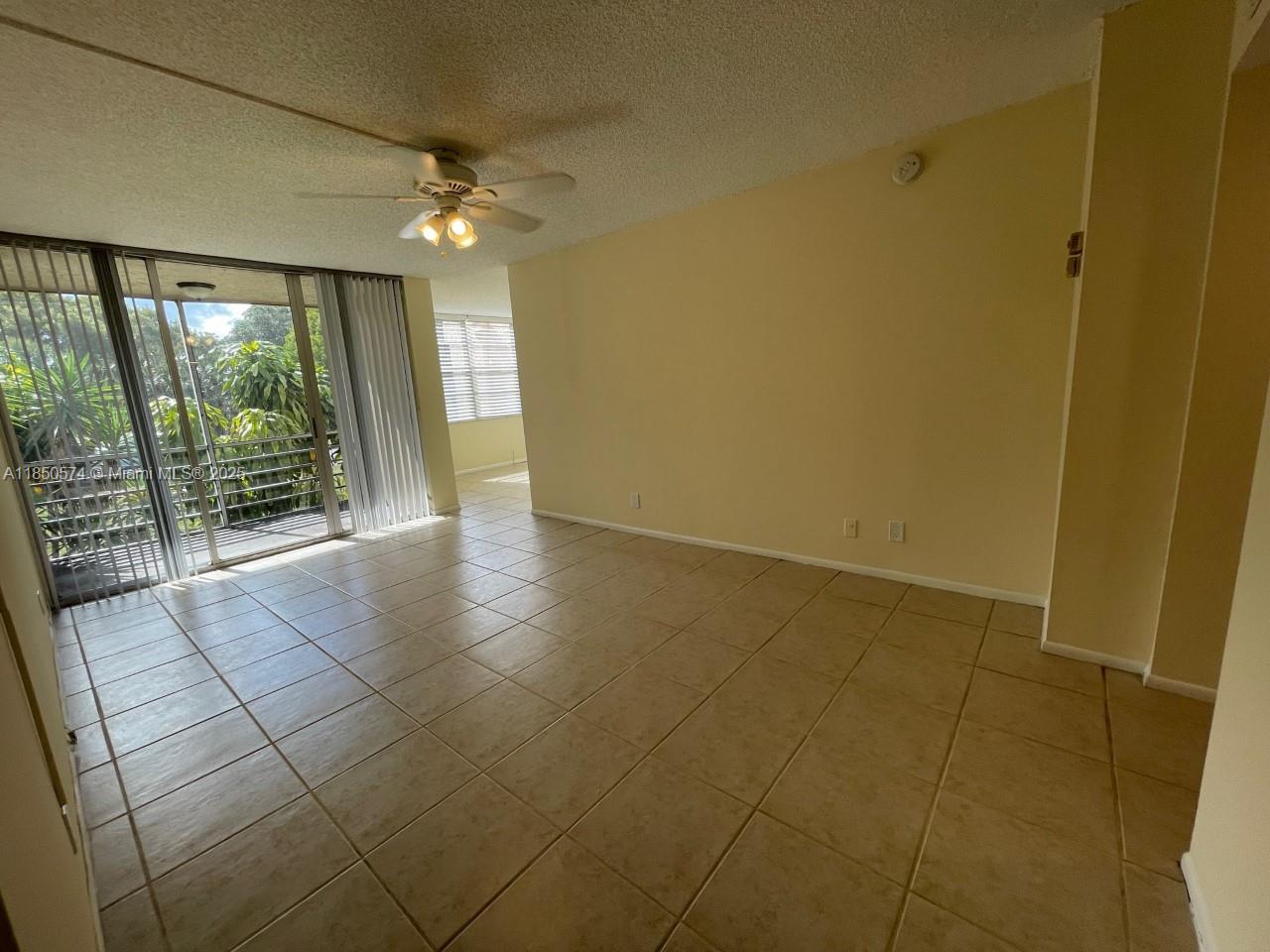 INVESTORS INVESTORS INVESTORS - RENTED FOR 2k A MONTH AND EXPIRING ON 07/07/2026 - PINE ISLAND RIDGE AT LIVE OAK, THIS RESIDENT/INVESTOR UNIT HAS ALL THE AMENITIES ONE MAY WANT. LOCATED ON A GOLF COMMNITY WITH LOCAL POOL, COMMUNITY POOL, BICYCLE AND JOGGING PATHS, PICK-NIK AREAS, TENNIS, PICKLEBALL, BASEBALL CAGE, LIBRARY, GYM, SAUNA, A FORMAL RESTAURANT AND A SPORSTS BAR, GOLF PRO SHOP, THEATER, WONDEFUL CLUB HOUSE WITH DOOR MAN AND OTHER AMENITIES, DESIGNATED PARKING PLUS PLENTY OF EXTRA PARKING, IT CAN BE RENTED RIGHT AFTER PURCHASE, THIS UNIT IS VERY BRIGHT AND LOCATED AT SECOND FLOOR, TILE AND WOOD THROW-OUT, AC IS ABOUT 2 YEARS OLD.