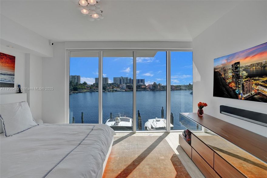 Introducing a spectacular, renovated 2BD+Den/3BA townhome at 400 Sunny Isles- a true boater's dream. The marina-front residence lives like a private home with direct garage access, 2 premium parking spaces and no elevator needed. Enjoy breathtaking water views from every room, private storage, and full resort-style amenities: waterfront pool, spa, tennis, cafe, and newly refreshed common areas. Moments to the beach, parks,dining,shopping and places of worship. Available furnished or unfurnished for the ultimate waterfront lifestyle in Sunny Isles.
