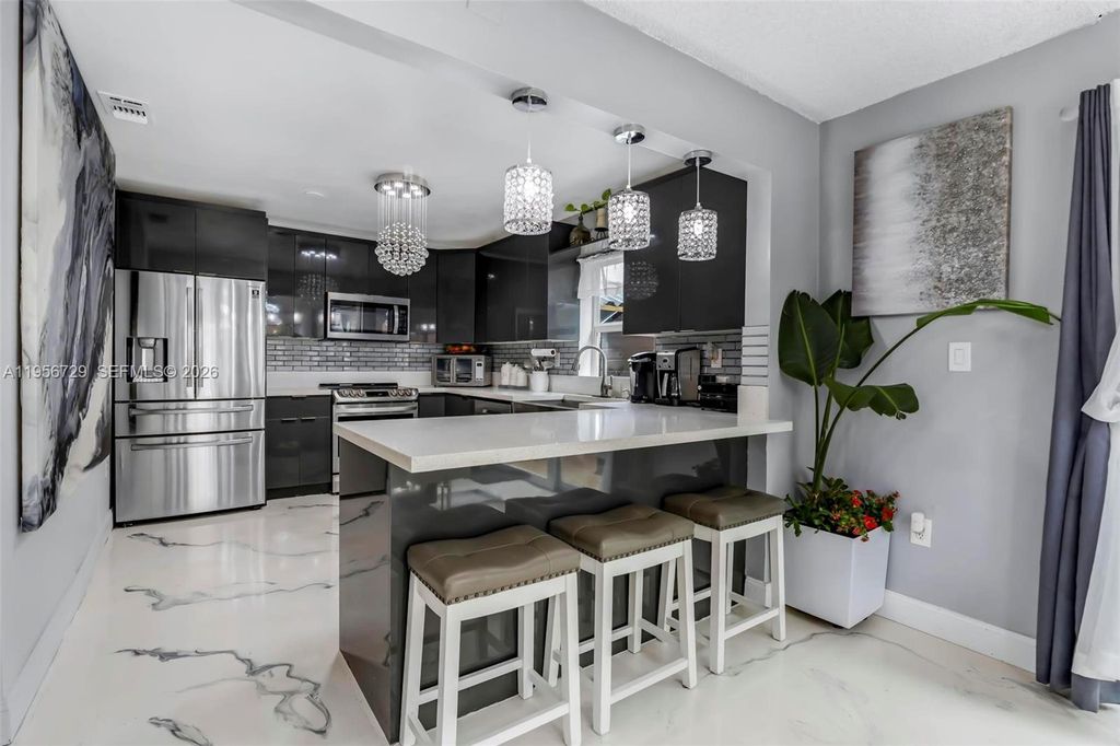 Photo of 3431 Java Plum Ave, Miramar, FL 33025 (MLS # A11956729)