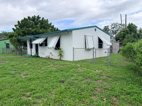Photo of 2911 NW 161st St, Miami Gardens, FL 33054 (MLS # A12071904)