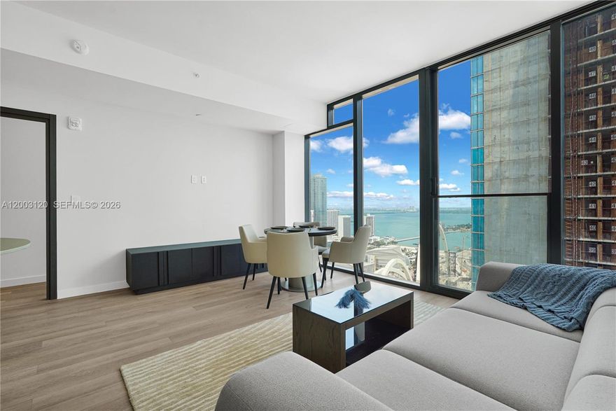 Experience two Units 4006 and 4007 combined. Experience the ultimate blend of luxury, flexibility, and income potential at E11EVEN Residences Miami. This beautifully designed residence showcases sleek modern finishes, floor-to-ceiling glass, and captivating city and water views that highlight Miami’s vibrant skyline. The versatile layout offers the ability to live, lease, or do both with ease, making it an exceptional opportunity for both end-users and investors.

This unit includes the OS&E package, allowing for seamless enrollment into the building’s hotel program—providing a turnkey, potential income-producing asset with the convenience of professional management. 

Indulge in a resort-style lifestyle with access to world-class amenities, including multiple resort-style pools, a state-of-the-art fitness center, spa services, fine dining, and 24-hour concierge. Enjoy the energy of Downtown Miami right outside your door, with Miami Worldcenter, top nightlife, and entertainment just steps away. Whether you’re unwinding poolside by day or stepping into Miami’s vibrant nightlife by night, this residence offers a lifestyle that is as exciting as it is luxurious.