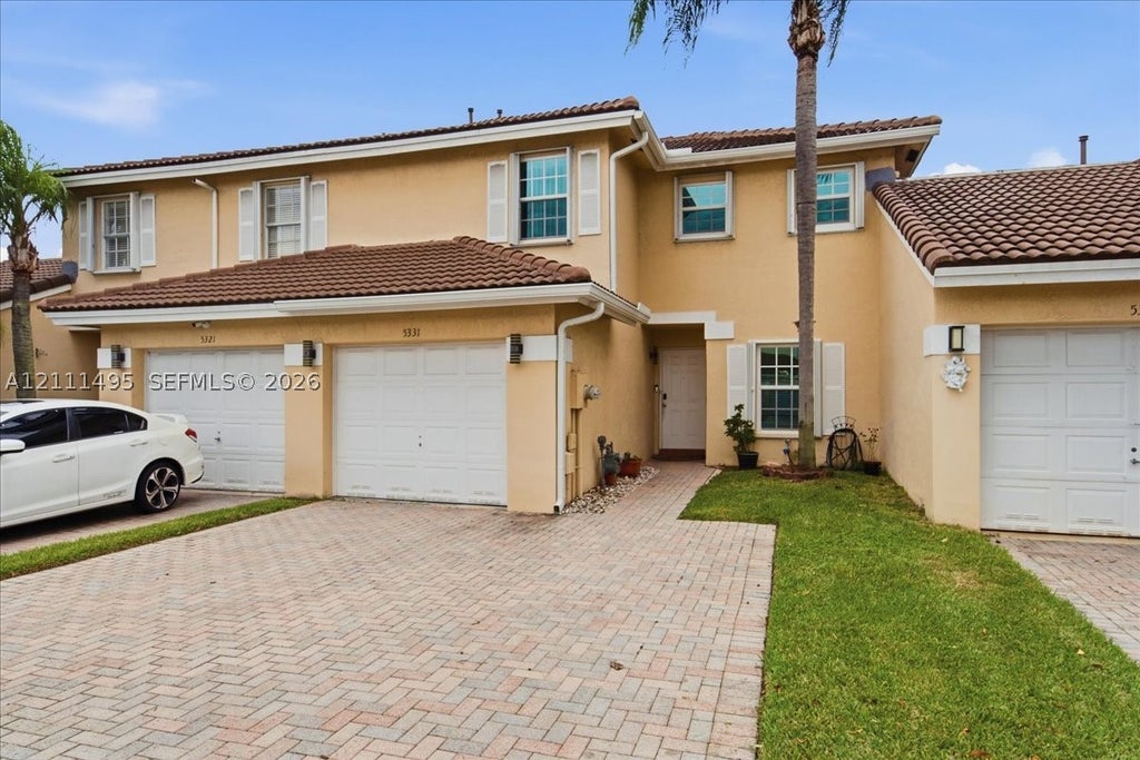 Photo of 5331 NW 89th Ter, Sunrise, FL 33351 (MLS # A12111495)