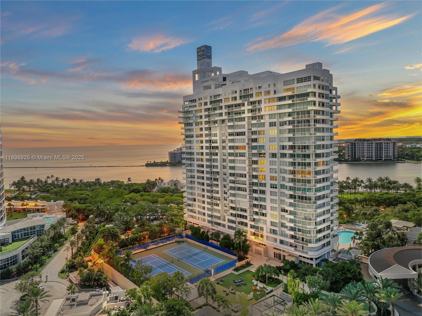 2 bed, 2.5 bath in highly desirable S of 5th location! Reconfigured 3/2 with open concept main living area! Impact windows throughout w/expansive ocean views. Wrap around terrace. Upgrades: Custom 1 of a kind Thinkglass dining island! High end appliances, including Jennair, Uline, Thermador Induction, Maytag Maxima, Everpure Helia Water system, Pharo Shower system & Toto Washlet! This unit has been upgraded and modernized in every imaginable way! Unit comes with 1 of a kind external storage unit that can be attached to unit for addtional closet space. 24-hour full service building with full service gym, tennis courts, 2 heated pools. Building nearing completion of 5 yr restoration w/ALL assessments PIF. Steps from fine dining, nightlife, shopping, parks & Atlantic Ocean. 2 deeded parking.