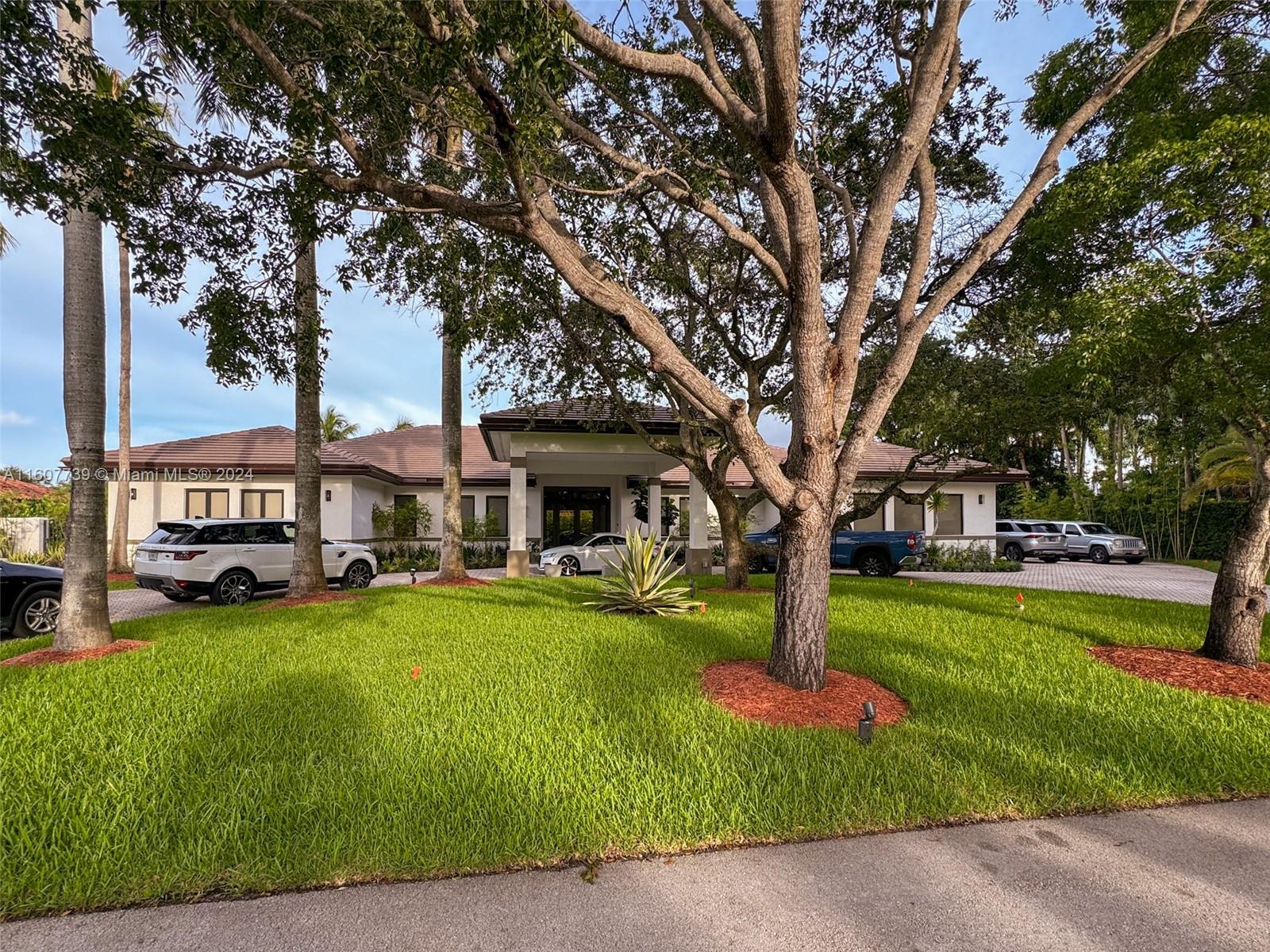 Beautiful 6,454 SQFT home located in the highly sought out GALLOWAY GLEN ESTATES. Newly renovated in 2023 with new roof, impact windows, brand new kitchen and appliances, 5 BRs and 5 BAs with a Studio/office or BR #6). Kitchen and family room with built-in wine cellar. Grand gourmet kitchen, large island, and a cozy pantry. Large separate laundry room with sink. All on an almost a half acre property with a sizable salt water pool with beach entry and jacuzzi. Garage with a side entrance and large spacious circular driveway with covered parking in front. 500-gallon propane gas tank, (2) tankless water heater gas, whole house audio by Sonos, surveillance cameras sys. Includes 24-hour security patrol by the Florida Highway Patrol. House is spectacular with an accommodating and roomy layout.