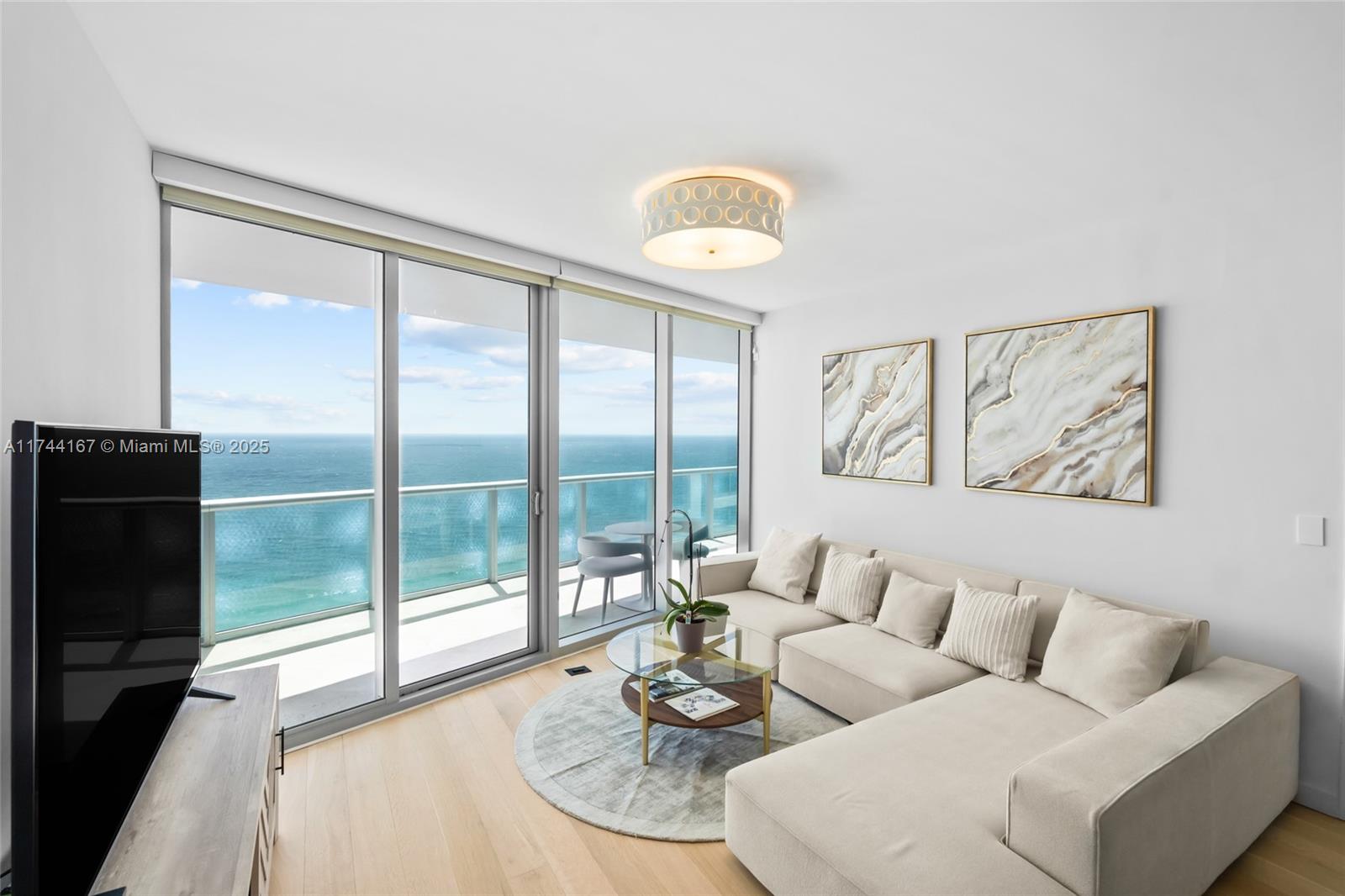This stunning 2B+den/3B oceanfront residence offers breathtaking panoramic ocean views and luxurious living. Features a private elevator foyer, an open-concept Italian kitchen with stainless steel Miele/Subzero appliances, and a spacious balcony perfect for relaxation. Located in the prestigious Jade Beach, this full-service building provides resort-style amenities, including beach and pool services, gym, spa, business center & children's playroom. Additional features include 2 pools, jacuzzi, outdoor bar and café, media and game rooms, and a conference room. Residents benefit from 24-hour concierge, valet, and security services. Located in the prestigious Sunny Isles Beach near Bal Harbour, Aventura Mall, and top dining options, this property perfectly combines luxury and convenience.