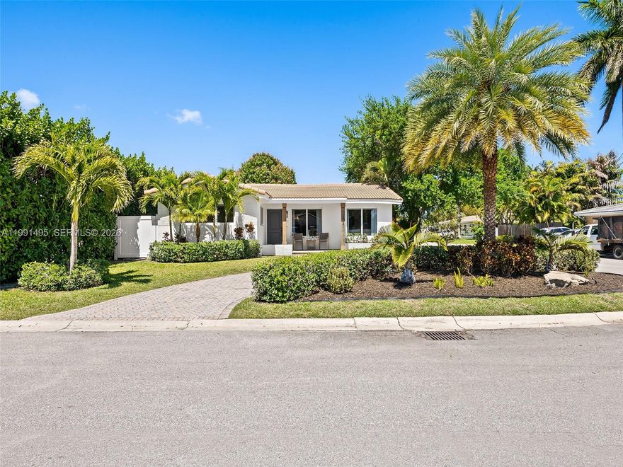 Beautiful and spacious 3-bedroom, 3-bathroom single-family home located in the highly sought-after North Lake neighborhood of Hollywood Beach. This charming residence features an open-concept layout with lofty interiors, an elegant kitchen with updated appliances, and tastefully designed bathrooms. Additional highlights include impact windows and doors, a newer roof, and a PVC privacy fence. Situated on an expansive corner lot of nearly 8,000 sq ft, the property is beautifully landscaped with ample room to add a pool. Just steps from North Lake and less than a mile from Hollywood Beach and vibrant downtown Hollywood, this home offers an exceptional opportunity for both comfortable living and long-term investment.