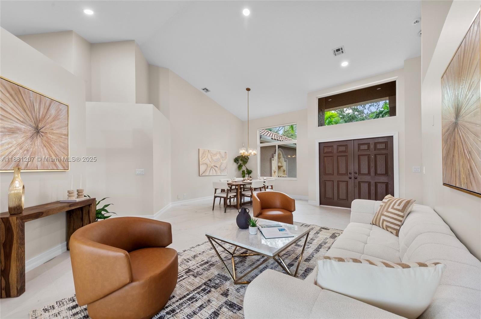 Tucked inside Grand Oaks at Weston Hills CC, this move-in-ready lakefront home with golf course views features a 2020 roof and a 3-bed, 2.5-bath layout across 2,067 SF. Interiors include marble and tile floors, full impact windows and doors, and easy flow between the living, dining, and family rooms. The chef’s kitchen has stainless steel appliances, gas range, granite counters, and a breakfast area overlooking the water. The primary suite offers a sitting area, dual sinks, and a separate tub and shower. Outside, the backyard has room for a pool and wide lake vistas with views of the 7th hole of the Tour Course. Gated community, walking distance to The Club at Weston Hills, and close to Weston Town Center and top-rated schools.