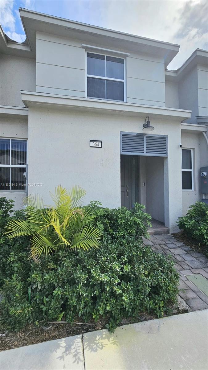 Modern 3-bedroom, 3-bath townhouse in Pompano Beach, just minutes from the ocean. New construction (1 year) with an open floor plan that blends living, dining, and kitchen into a bright and inviting space. One bedroom with full bath on the first floor plus two additional bedrooms upstairs. Features include 2 parking spaces right at the door, exterior cameras, smart panel, washer/dryer, and BBQ. Optional furniture in the first-floor bedroom. Enjoy the coastal lifestyle in a modern, secure, and move-in ready home. No association app fee. Rapid Approval