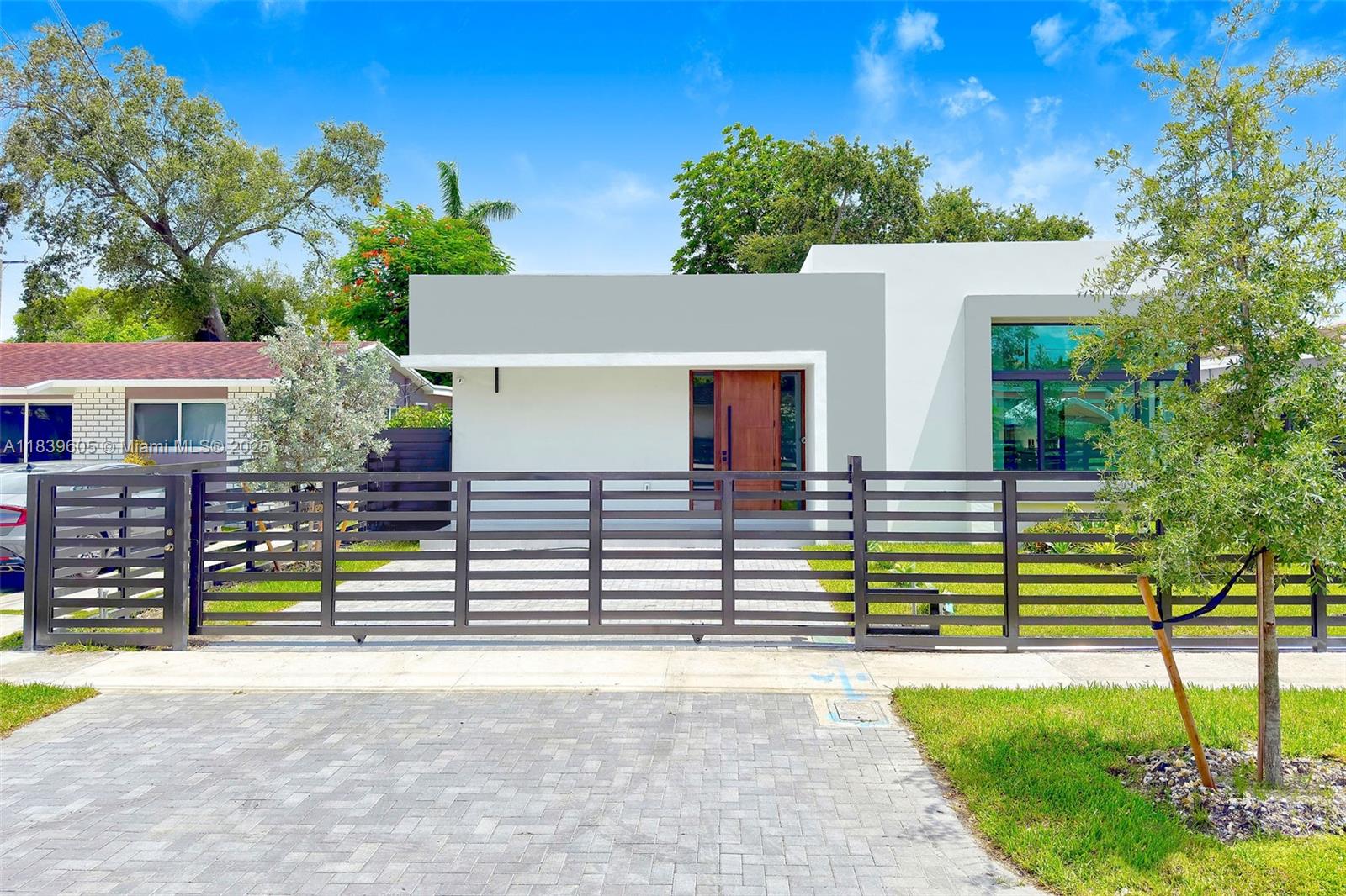 Modern elegance and functionality come together in this brand-new 1,722 sq ft single-family home located in the desirable Little Gables neighborhood. This 3-bedroom, 2-bath home features premium finishes throughout, including imported Italian doors, large-format flooring, and a custom kitchen with high-end appliances. The open-concept layout flows to a private backyard with a newly built pool ideal for relaxing or entertaining. The property also includes a smart security camera system. A true turnkey home that blends sophistication with timeless comfort.