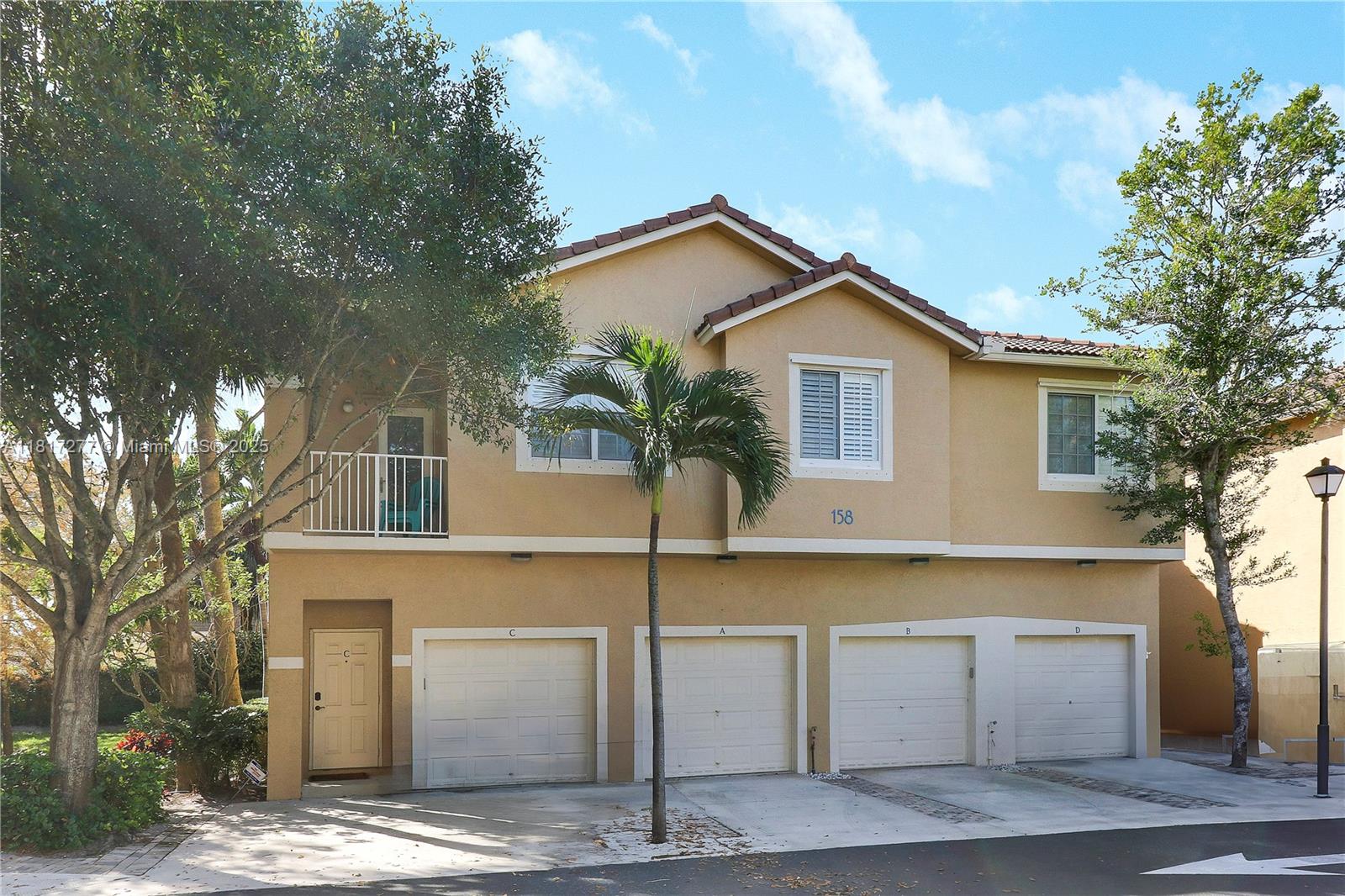 Welcome home to 158 Village Blvd B. Located in Tequesta Cay, in the charming Village of Tequesta. This beautifully renovated second-story condo features 3 bedrooms, 2-bathrooms and a 1-car garage. Step inside to an open living and dining area that are filled with natural light. There are light finishes, contemporary fixtures, recessed lighting, plantation window shutters throughout, and lovely flooring throughout the home. The remodeled kitchen boasts KitchenAid stainless steel appliances, custom cabinetry, beautiful tile backsplash, quartz countertops, and two hallway closets that can be used as a pantry for additional storage. The spacious bar top has seating for four and makes this the perfect space for meal preparation and casual dining. There is also an additional formal dining space