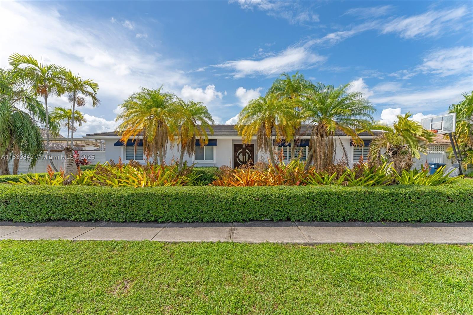 LOCATION, LOCATION! This exquisite home, situated on a quiet cul-de-sac, offers an unbeatable combination of space, style, and comfort in one of the most desirable neighborhoods. Step inside to discover a bright and airy open floor plan, featuring stunning new flooring throughout. The kitchen has been fully updated with sleek quartz countertops, top-of-the-line new appliances, and ample storage space—perfect for both cooking and entertaining. The expansive backyard is a true retreat, ideal for hosting gatherings or relaxing by the pool. Enjoy the outdoors under the covered terrace, offering a perfect space to unwind. Additional features include impact windows throughout, ensuring both safety and energy efficiency. This home is a true gem and won’t last long—don’t miss out!