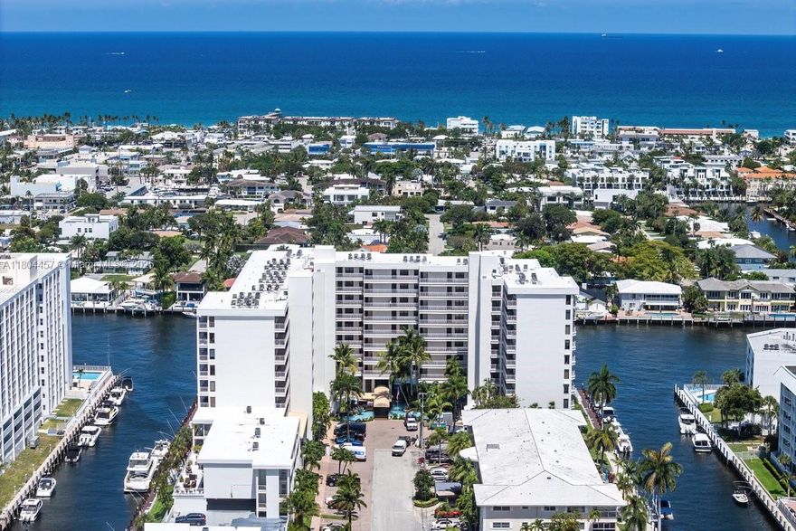 Penthouse floor with stunning water views from every room. Floor to ceiling impact windows in the living room looking at the ocean, up the Intracoastal waterway to downtown Ft. Lauderdale. Split 2 master bedrooms with ensuite bathrooms plus a full guest bathroom. Beautifully updated, in meticulous condition. Large open living room dining room for entertaining. Kitchen Aid appliances. Abundance of closet space. One parking space in lower garage. The Pilot House has completed the 40-year recertification, Sirs report, concrete restoration/painting, impact window building, new roof, no special assessments. In Coral Ridge Country Club Estates on the Intracoastal. Lobby security, gym, heated pool and boat slips. CLose to the beach, shops and restaurants. Resort living at its finest on the water.