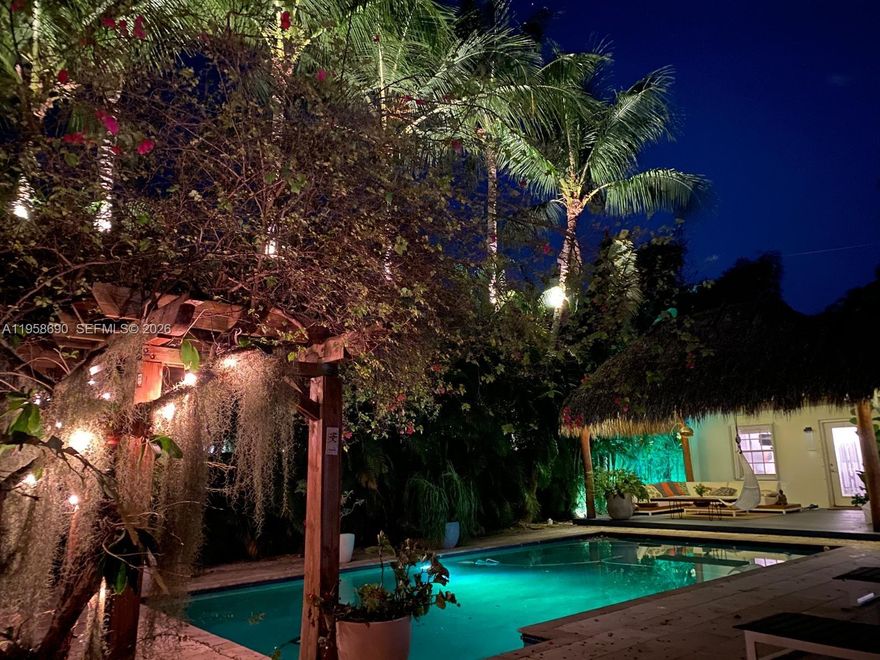 • Updated home with modern finishes, clean lines, and stylish indoor-outdoor flow
• New roof (2018) with certification — an enormous reassurance for buyers
• Well-maintained systems and tasteful renovations throughout
• Open plan living/dining area + designer lighting and custom millwork
• Private backyard with large pool and pergola lounge area — resort living at home
• Tropical landscaping and night lighting creating a serene ambience


Located in the heart of highly sought-after Belle Meade, this beautifully updated residence offers the perfect blend of privacy, lifestyle, and future potential. Set on a lush, tropical lot just moments from Biscayne Bay, the home features a seamless indoor-outdoor flow, expansive entertaining areas, and a tranquil resort-style backyard.

The property has been thoughtfully updated and includes a new roof completed and certified in 2018, providing peace of mind for the next owner. The backyard is a true oasis with a large pool, pergola lounge area, and mature landscaping that creates complete privacy.

This prime lot also presents exceptional redevelopment potential, allowing for a future two-story residence with possible bay views due to its proximity to the water.

Ideally located minutes from the Design District, Midtown, Downtown Miami, and major thoroughfares, this property offers a rare opportunity to enjoy Belle Meade living today while securing long-term upside.