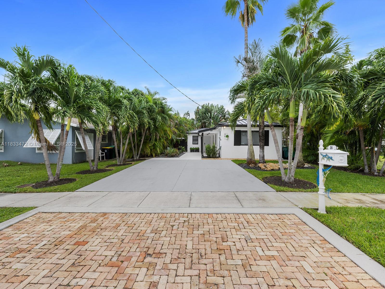 Seeking the perfect South Florida getaway or executive rental? Look no further! This stunning, fully furnished 2 bed, 2 bath unit offers a modern and chic design with new baths, SS appliances, and top-tier finishes. Enjoy your private, heated pool and BBQ area in a tropical backyard. Half of a totally modernized duplex with lush landscaping and immaculate attention to detail, this impeccable home offers a shared washer and dryer with the one bedroom unit, located on back patio for your convenience. All just minutes from Dania beaches (under 2.5 miles!), the airport, and highways. Just bring your suitcase!
