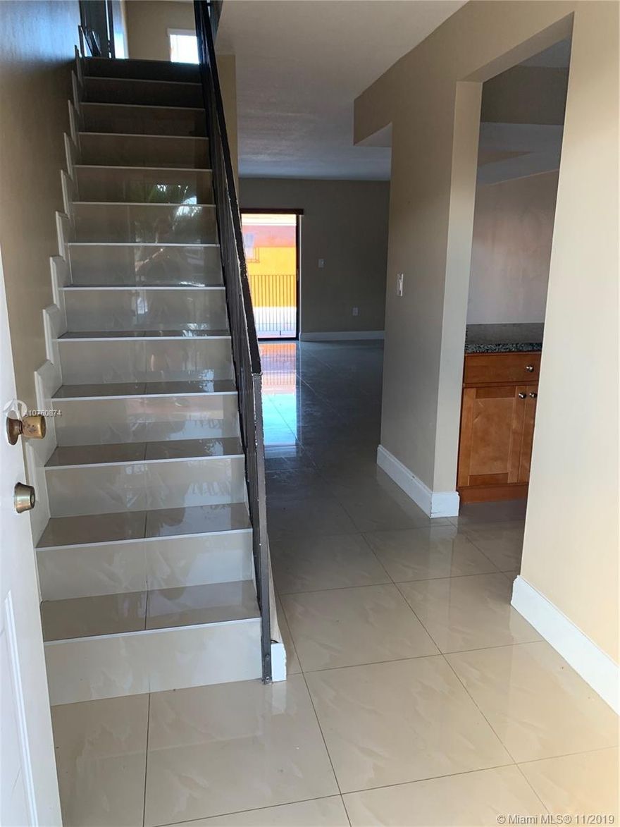 UNIT IS COMPLETELY UPGRADED,  CLOSE TO EVERYTHING, SCHOOLS, HIGHWAYS. HOSPITALS, SHOPPING CENTERS, TWO ASSIGNED PARKING SPACES, WASHER & DRYER INSIDE.