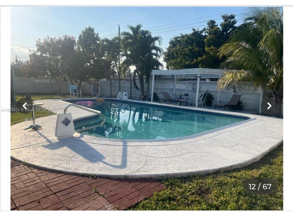 Photo of 5001 Madison St, Hollywood, FL 33021 (MLS # A11904925)