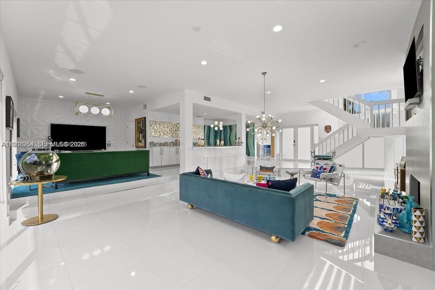 Completely renovated 2 story end unit with unobstructed golf course view, nestled in the coveted El Dorado enclave of Boca Pointe. This reimagined 3400 sq.ft residence with 3 bedrooms plus office and 3.5 baths showcases designer finishes, premium appliances and refined decor throughout, blending luxury and comfort. Ideal for entertaining with an open, light-filled floor plan. Features impact windows/doors, new roof, freshly painted exterior. Interior offers a chef’s kitchen, breakfast nook, marble baths, solid bamboo flooring, 3 new AC's, tankless water heaters, full smart home/energy efficient. No expense spared. For the most discerning buyer.