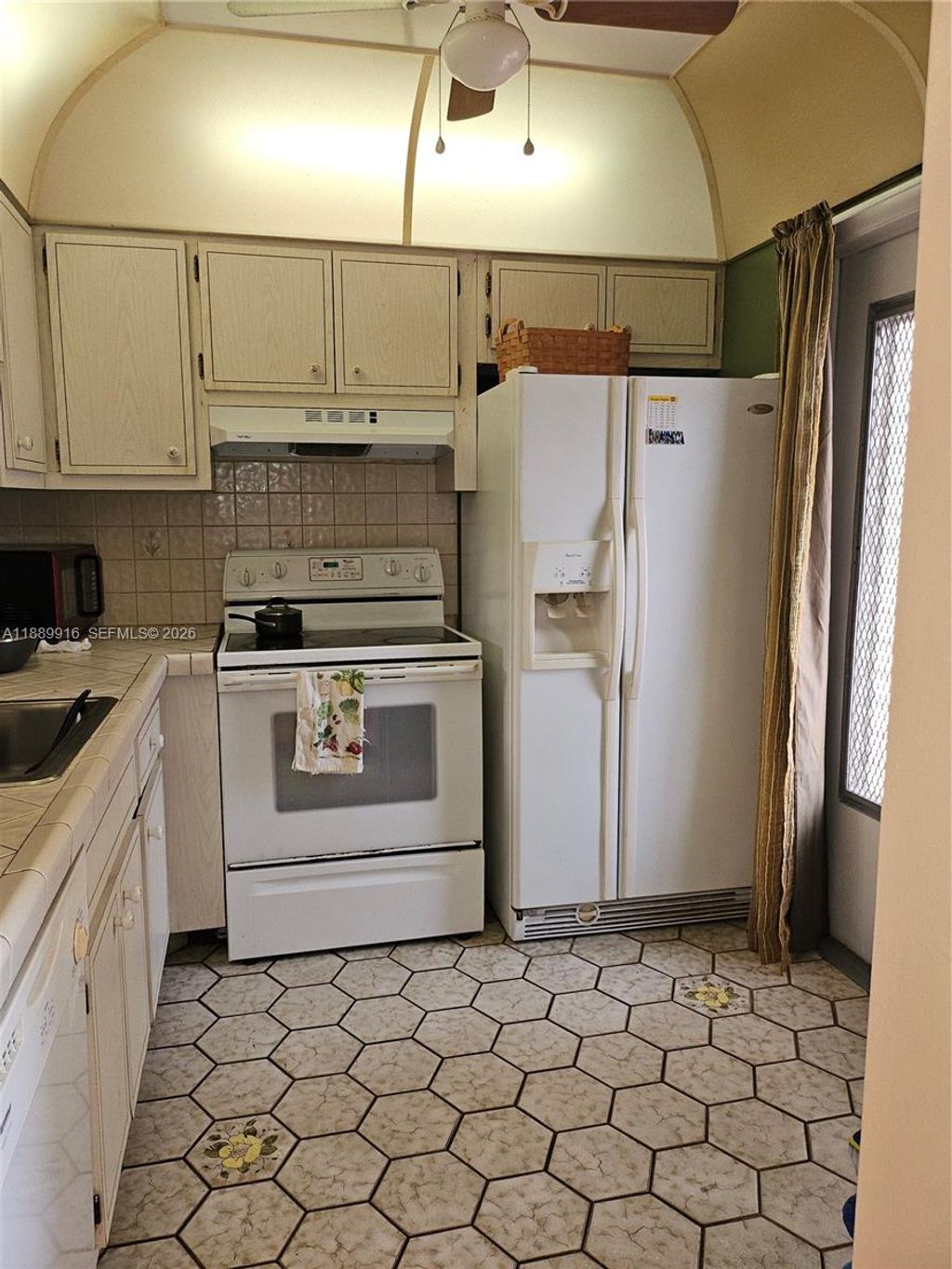 Photo of 5121 W Oakland Park Blvd #211, Lauderdale Lakes, FL 33313 (MLS # A11889916)