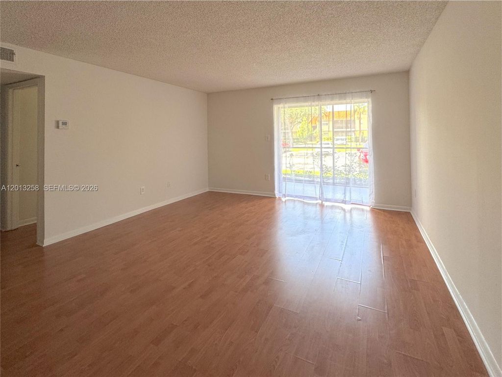 Photo of 1281 SW 46th Ave #2505, Pompano Beach, FL 33069 (MLS # A12013258)