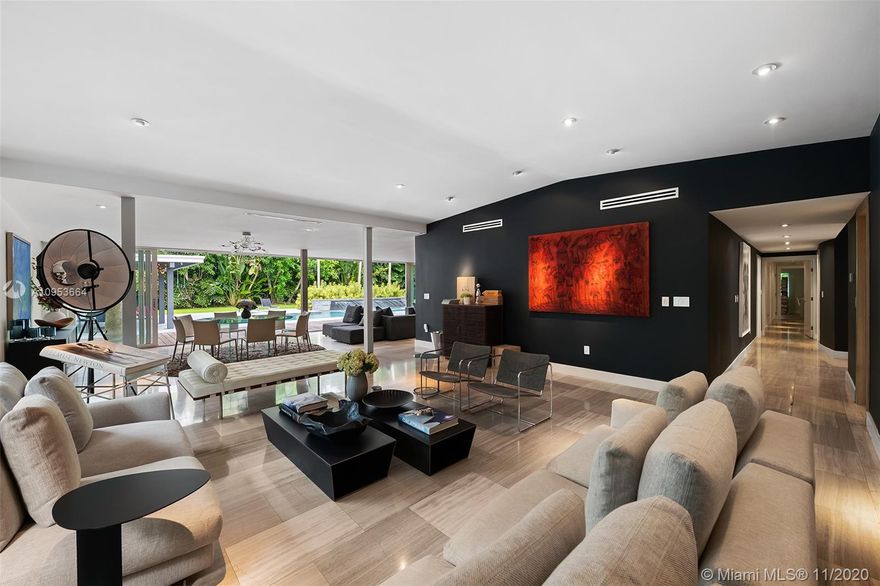 Easy living in mid-century modern elegance! Located in the sought after Ponce-Davis area, this gated private estate has gorgeous designer finishes, lots of indoor and outdoor entertaining and living spaces and a large lot for privacy. Italian Snaidero gourmet kitchen with top of the line appliances and skylights. Sublime master suite overlooking the private backyard. Separate office and maids quarters, Indoor/Outdoor Sonos sound system, Lutron lighting & power shades.  Lap pool surrounded by a private backyard oasis with a feature wall and fountain, summer kitchen, shaded pergola, flamed granite tile and IPE pool deck, full house generator and 3-car garage. This home represents the ultimate in sophisticated wellness living!