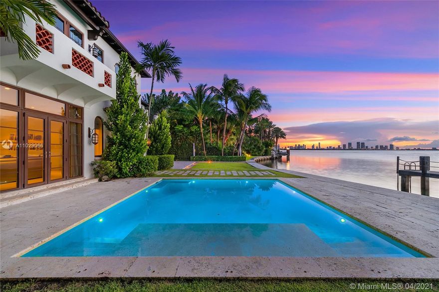 Surrounded by lush landscaping this classic Spanish style estate boasts privacy & open-air courtyards. Experience unparalleled finishes & breathtaking wide bay views throughout this magnificent estate. Enter this tranquil private oasis through handcrafted iron doors to stunning courtyards surrounded by fountains & beautiful foliage. Walk through the main door of the home to stunning water views, arched walkways & impeccable attention to detail. Features:7BR, 8+1BA, high ceilings, expansive formal dining room, full wet bar, chef’s kitchen, expansive principal bedroom overlooking the water, oversized dual walk-in closets, principal bathroom suite complete w/ marble steam rain shower, office, housekeeper’s quarters w/ a full bathroom & stunning outdoors w/pool, outdoor kitchen & private dock.