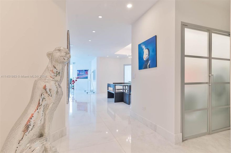 Impressive Pre Penthouse level corner unit. Soaring 10" high ceiling and sought after open railing balcony, Upgraded kitchen and bathroom. Majestic Views of the Bay, Ocean and Miami's Magic Skyline!
Three assigned covered parking spaces (L4-153 and 154); L3 to 4 Ramp (368) and one assigned storage (Level 4)  included. 
Price is firm.