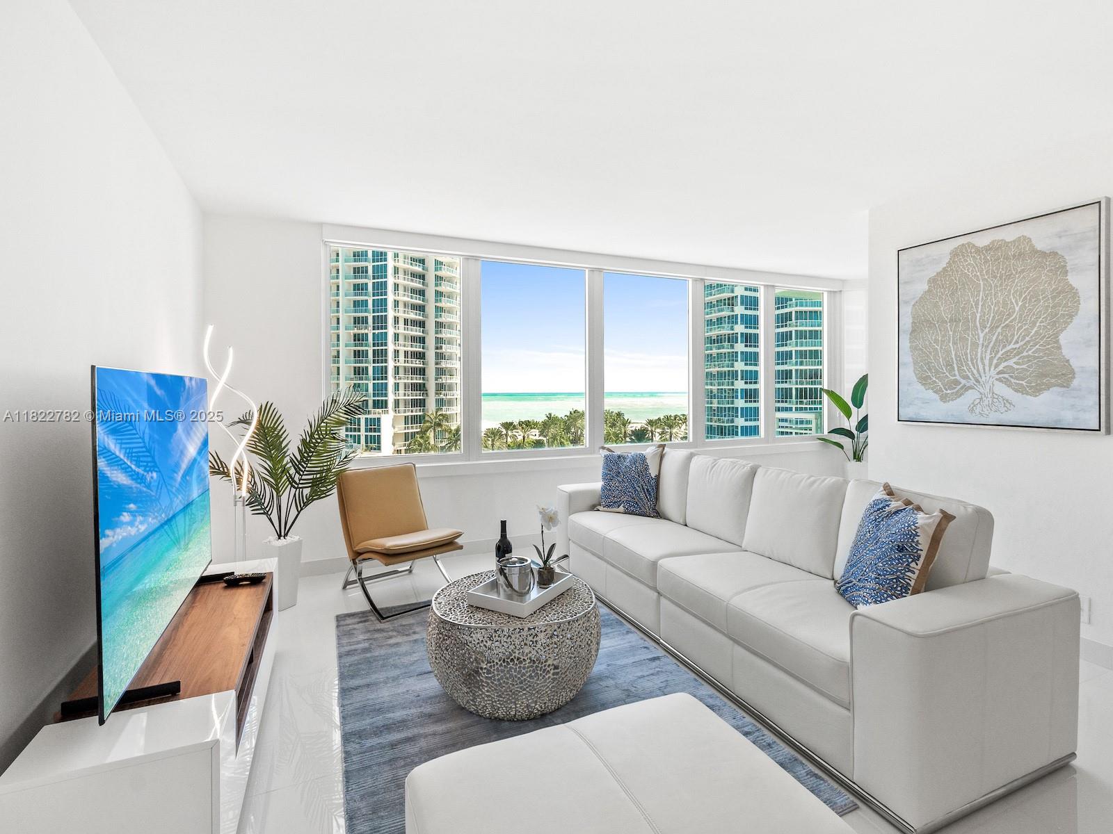 Completely remodeled 1 Bedroom+Den 2 Baths residence with sweeping ocean vistas in the renowned South of Fifth neighborhood. This stunning beach home features an elegant design & open floor plan flooding the residence with natural light & beautiful ocean views from every angle throughout. The oceanfront residence offers a sleek open kitchen with a huge countertop and stainless steel appliances, & perfectly outfitted with wood & glass cabinetry. Wake up to the ocean in the well-appointed master bedroom suite, with a modern ensuite bathroom with a walk-in shower and a large walk-in closet. The Den is equipped with a murphy bed with custom wall panels, lots of cabinets, and storage. A world-class 5-Star resort with pool, fitness center, tennis, security, valet, concierge, parks & restaurants