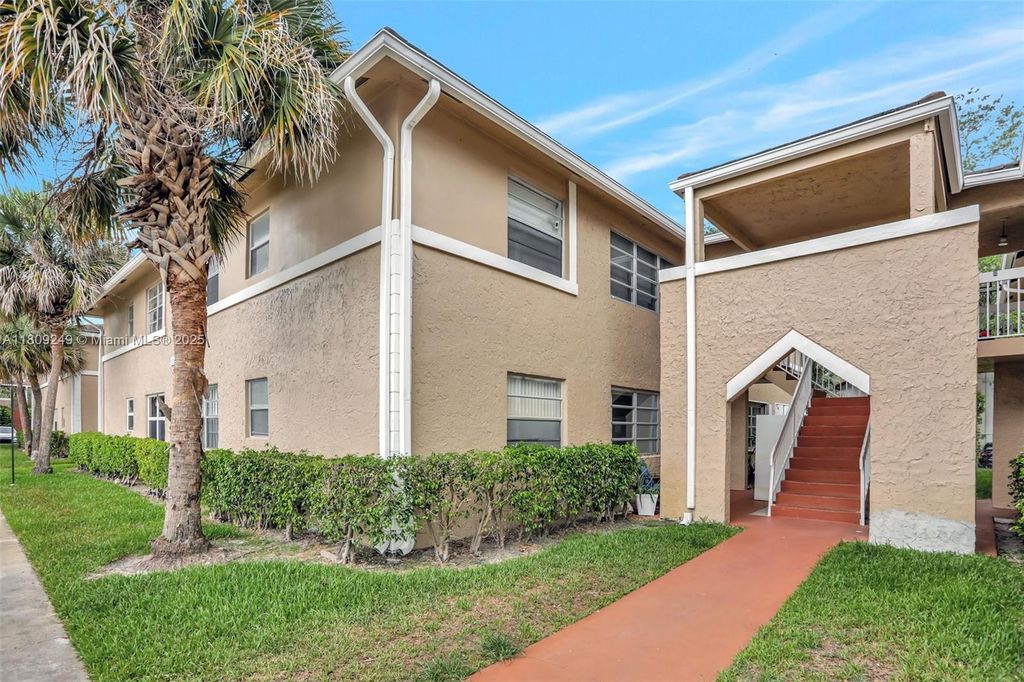 Photo of 826 Twin Lakes Dr #18-D, Coral Springs, FL 33071 (MLS # A11809249)