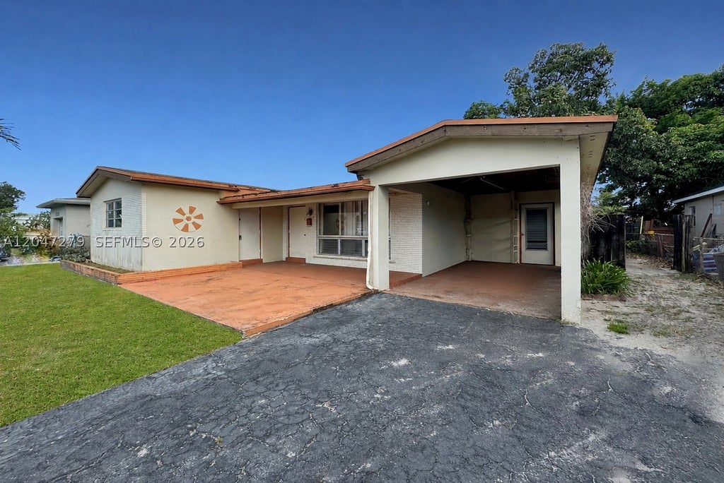 Photo of 7912 Juniper St, Miramar, FL 33023 (MLS # A12047279)