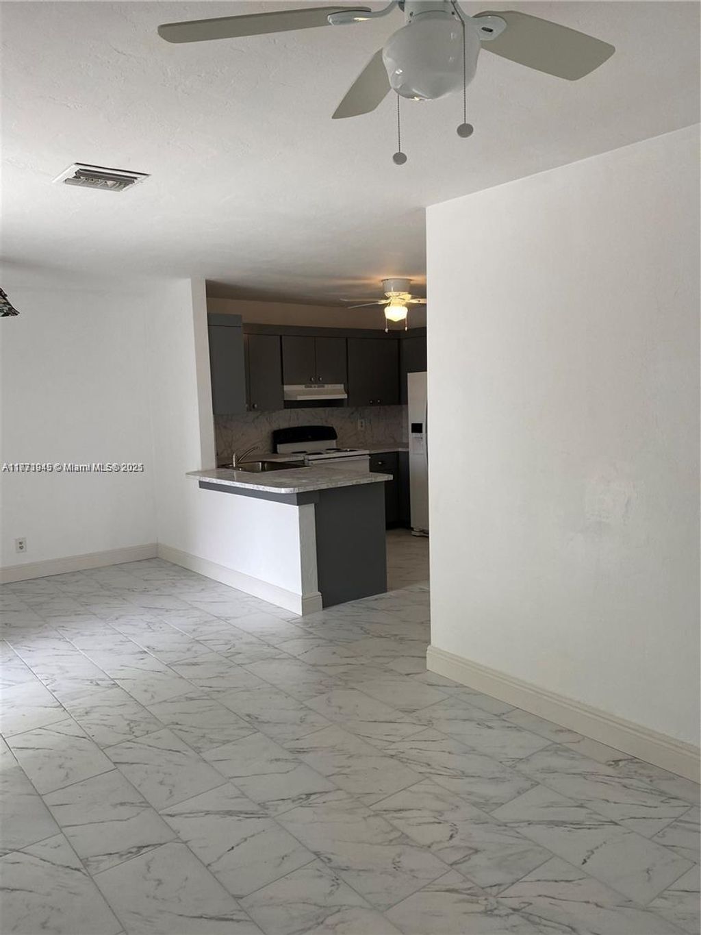 Photo of 6800 SW 18th Ct #1, North Lauderdale, FL 33068 (MLS # A11771945)
